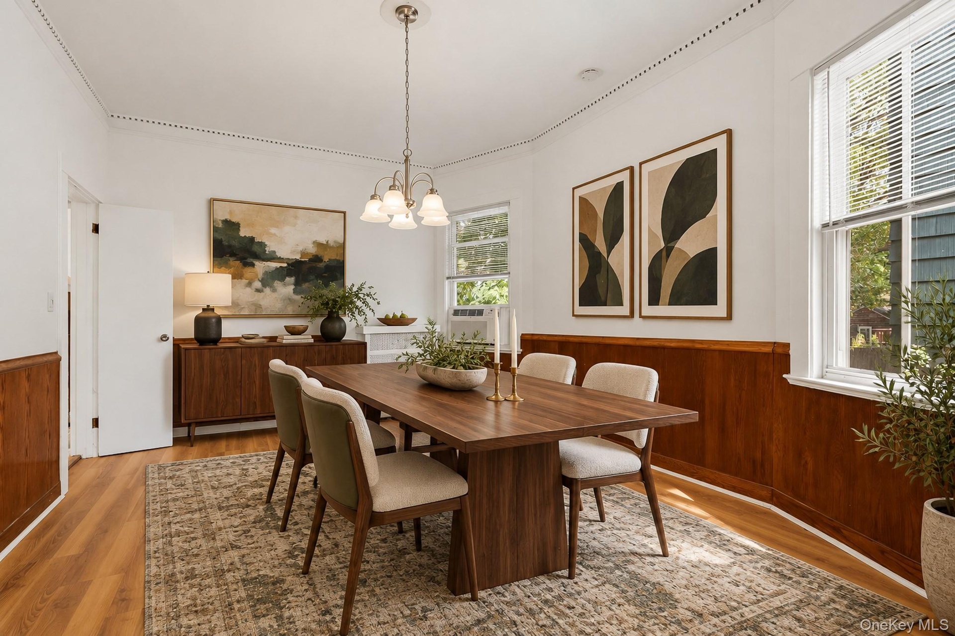 Virtually Staged Dining Room with ample room for an 8-person table