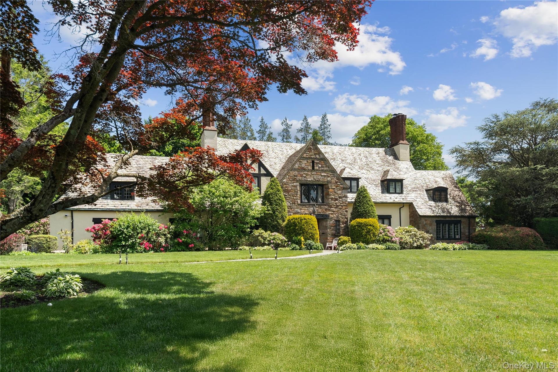Welcome to 34 Hevelyn Road located on the grounds of the prestigious Knollwood Country Club!