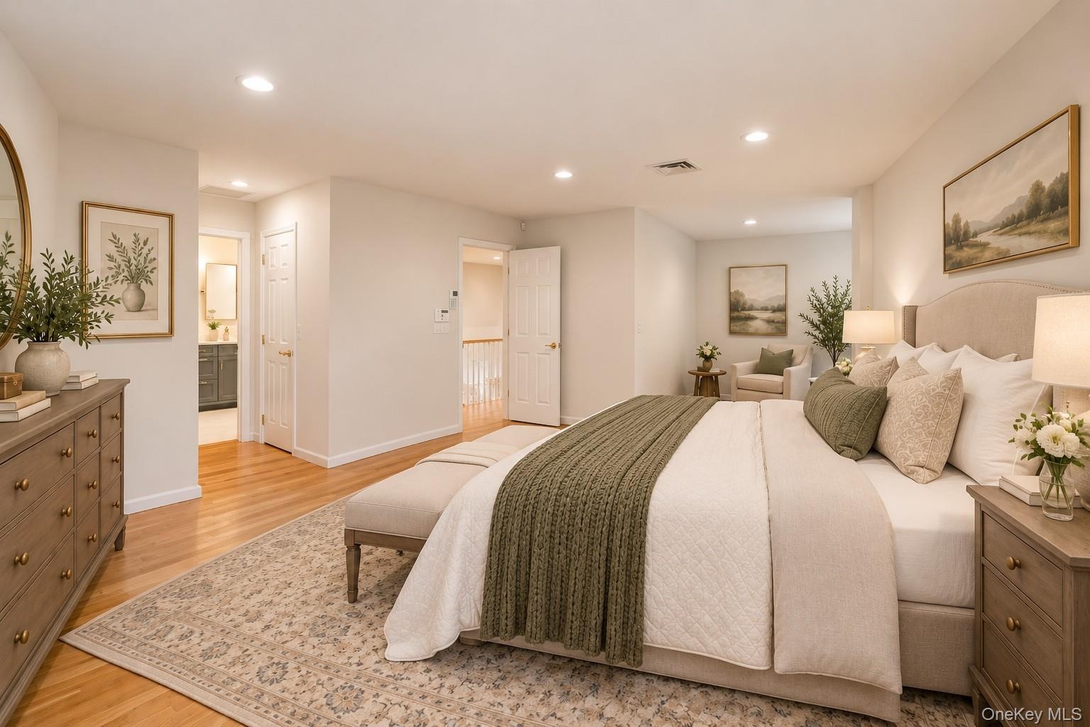 Digitally Staged Primary Suite with Sitting Area and large WIC