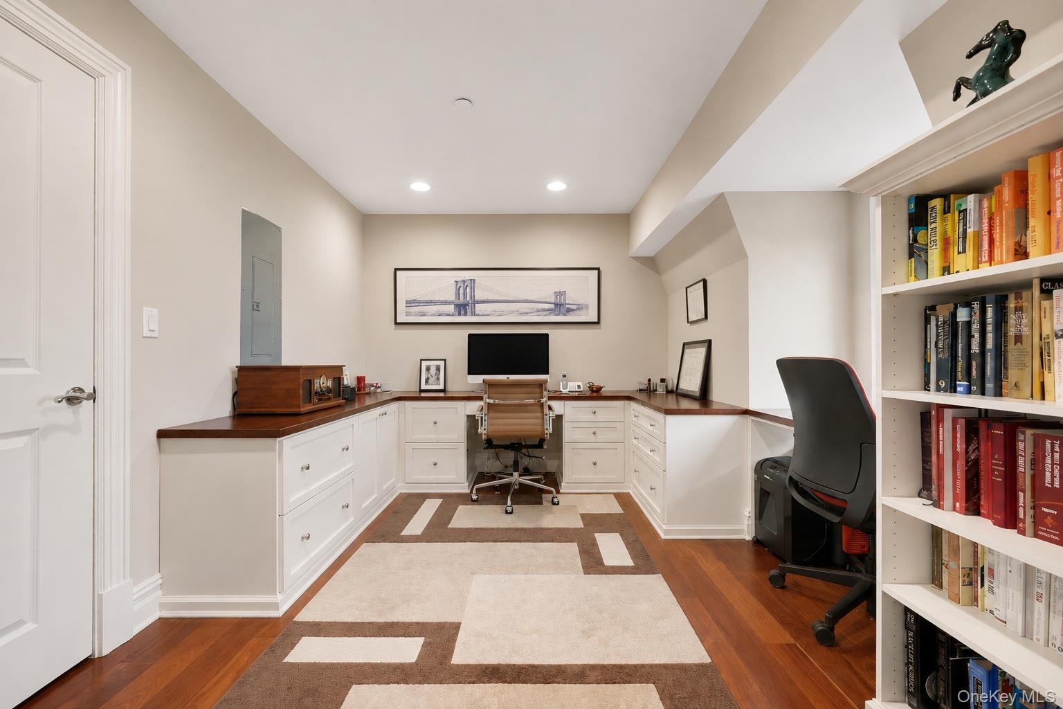 4th floor office with custom built-in desk and cabinetry