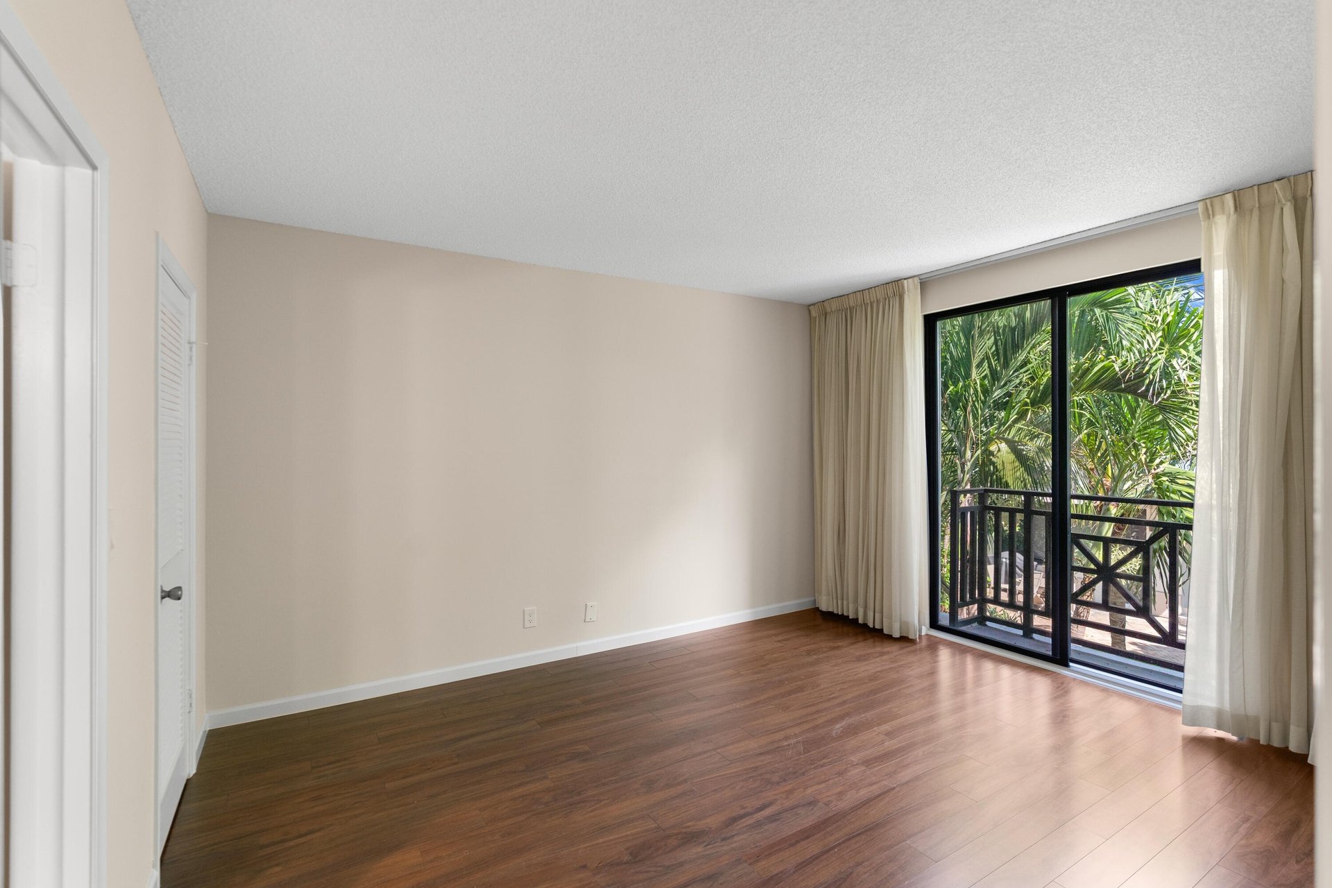 Primary bedroom with sliders