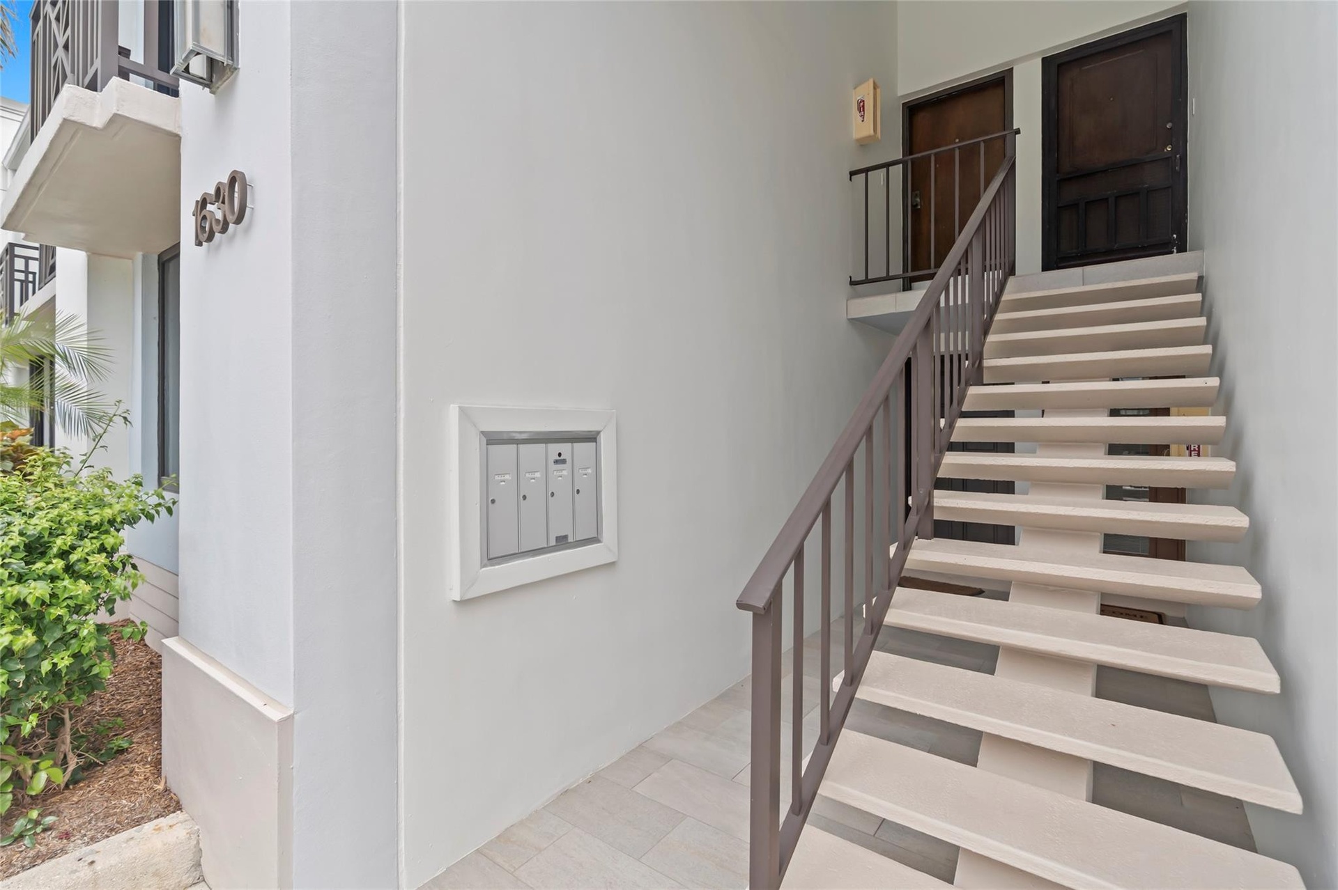 Stairs to unit on 2nd floor
