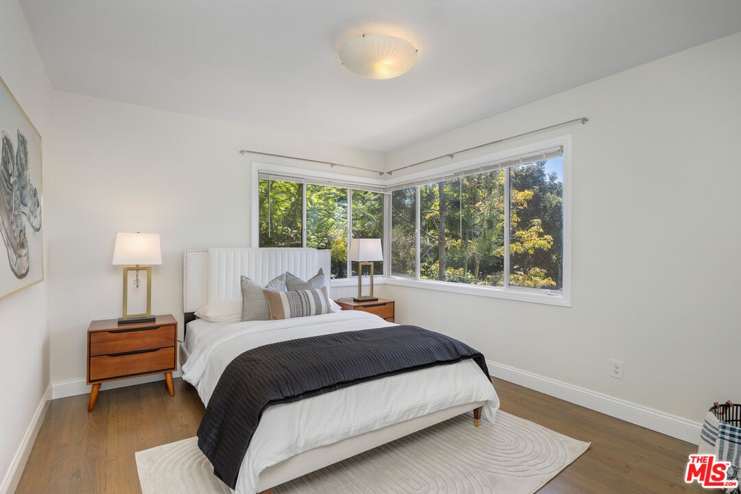 Guest bedroom with lots of nat
