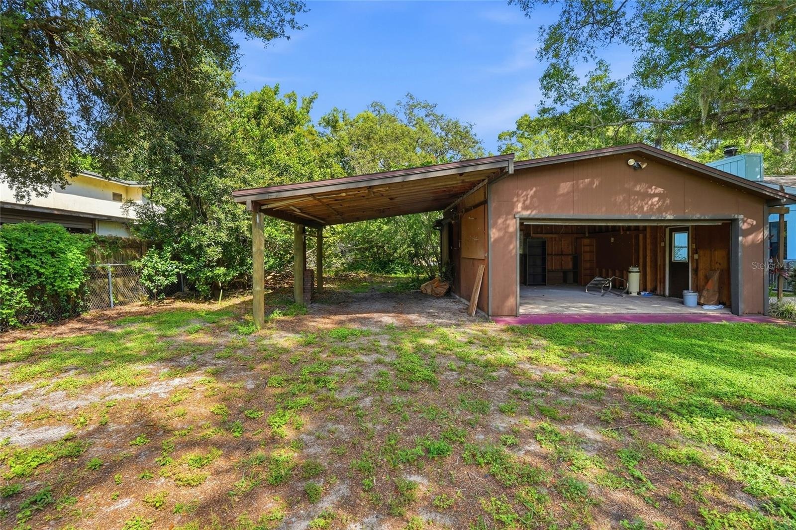 Detached 2-Car Garage with additional Carport Space