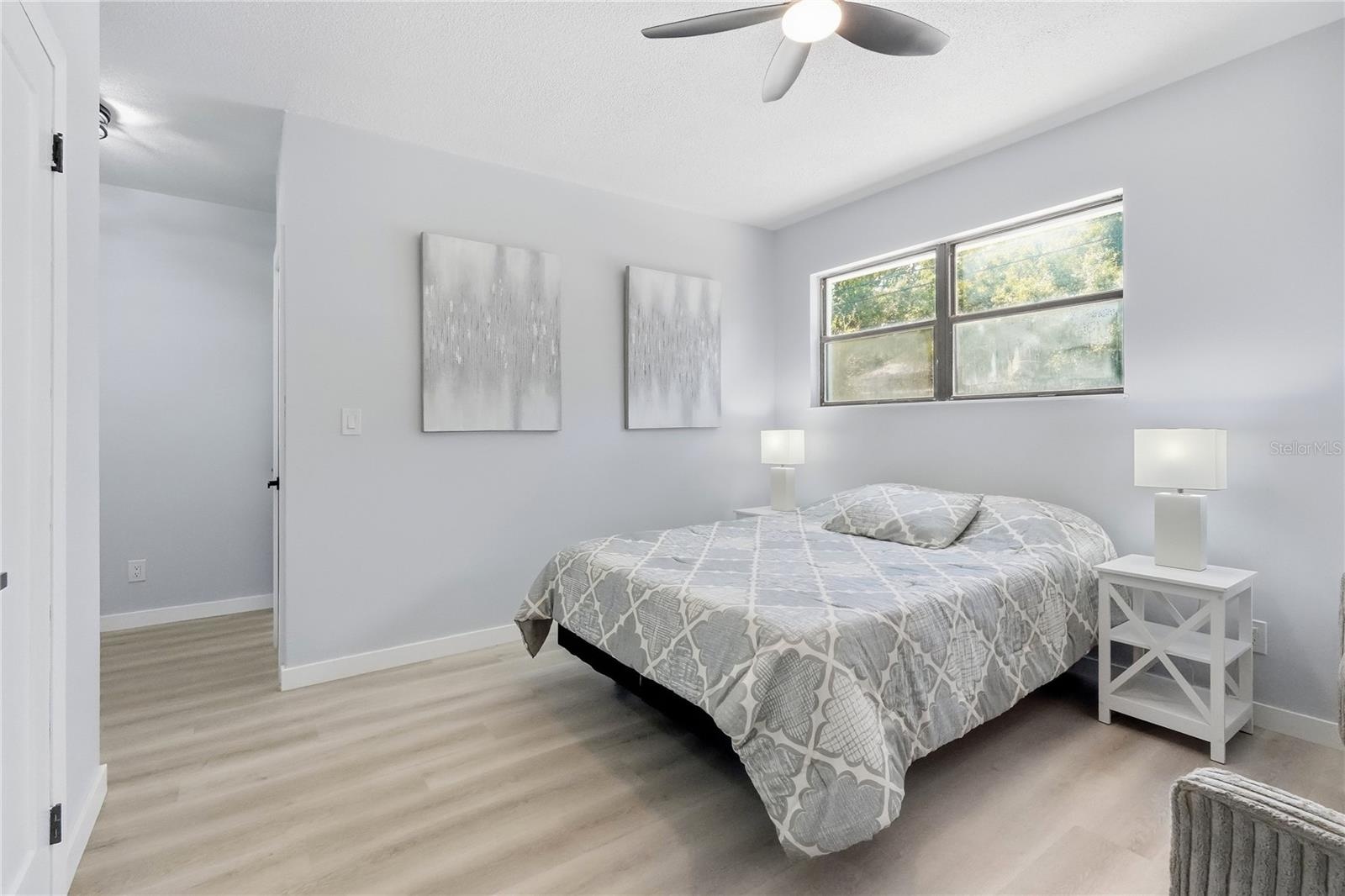 In-Law Suite - easily mount a TV on this wall showing art.