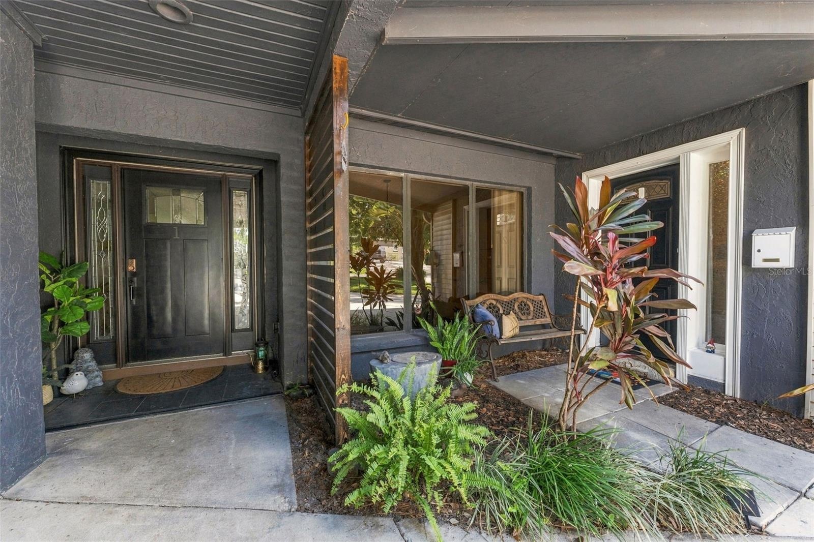 Main Entrance and attached apartment entrance on right
