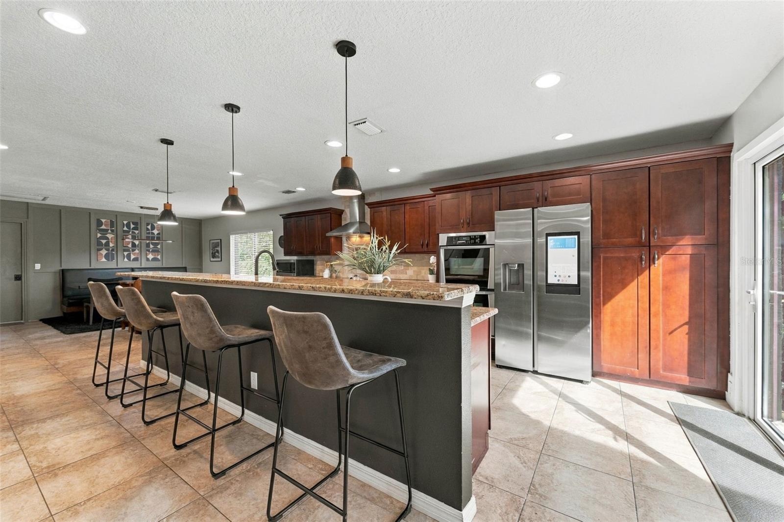 Flooded with natural light from accordian glass doors