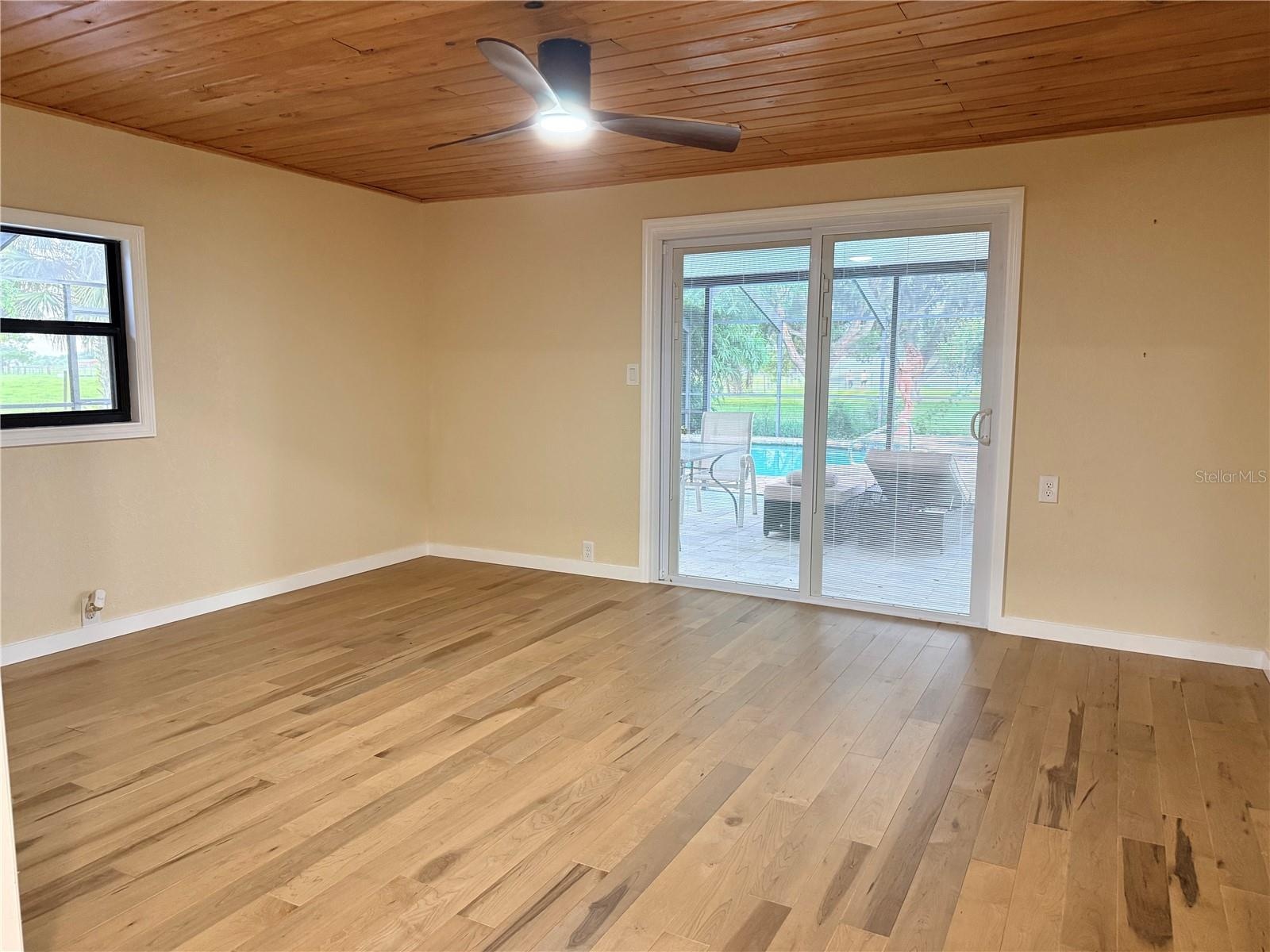 Beautiful wood floors and tongue and groove wood celing
