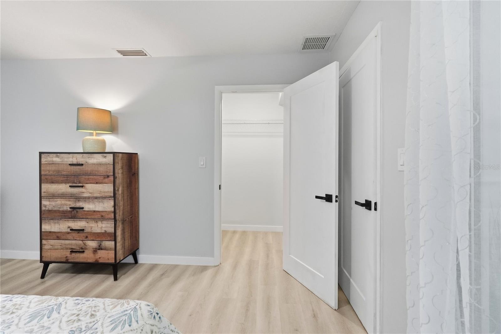 Primary Bedroom - this is ONE of the TWO Walk-In Closets.