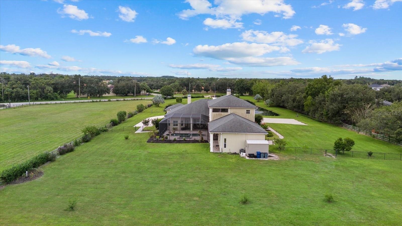 Drone photo of the home from the back pasture