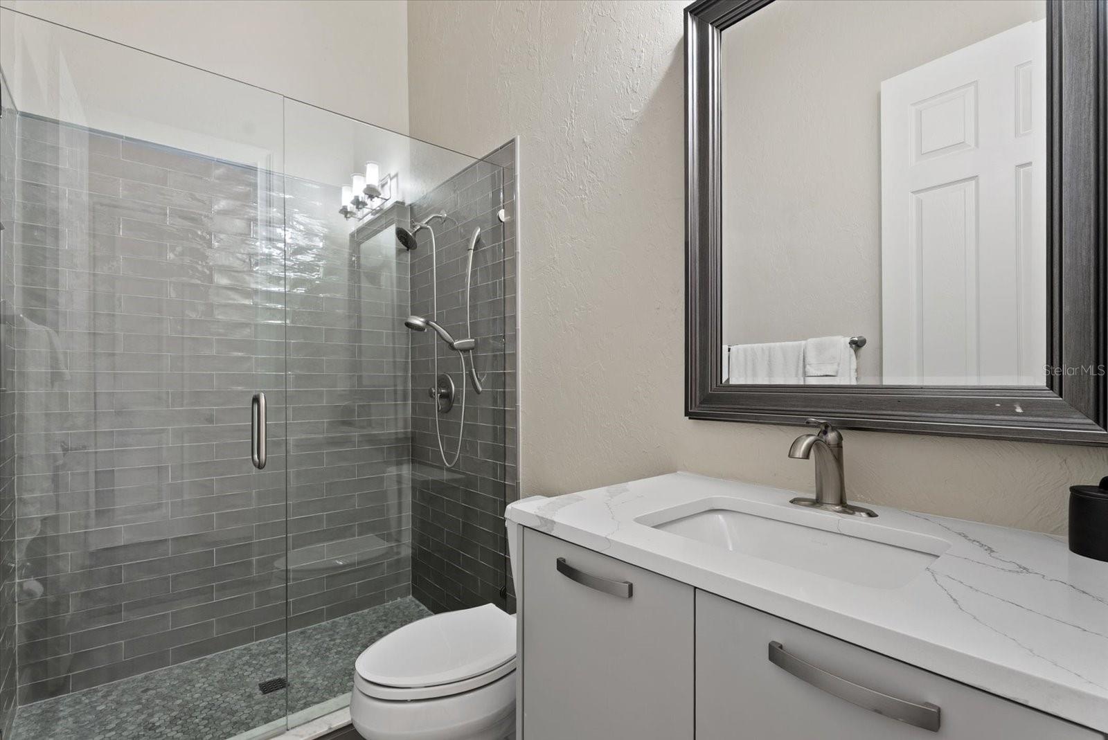 The ensuite bathroom for the second bedroom