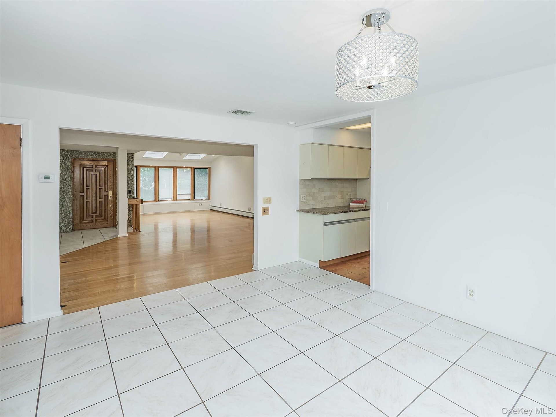 Dining room is open to both the living room and kitchen