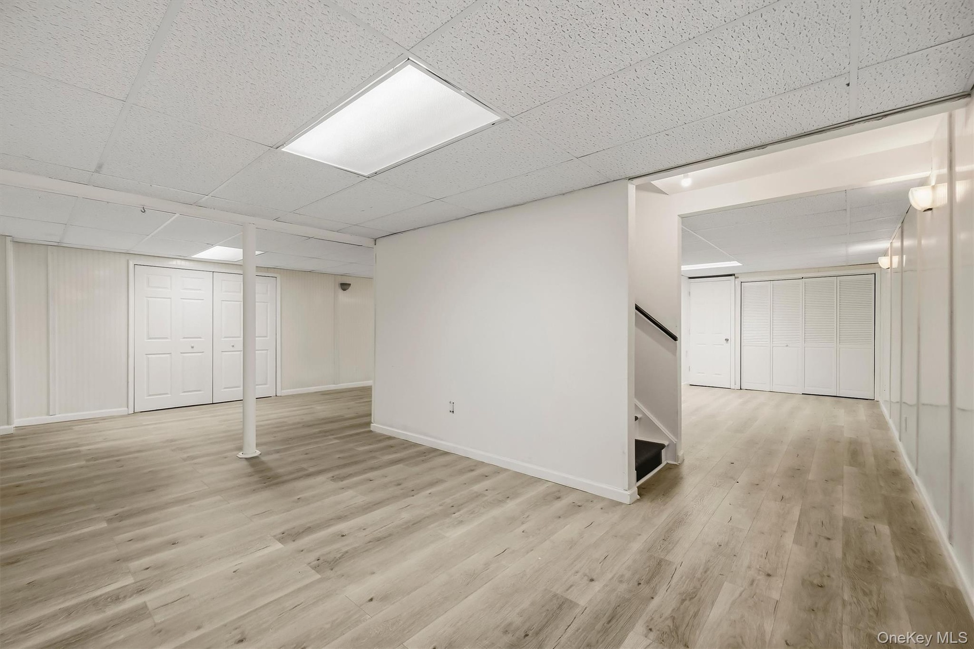 The lower level dramatically expands the home’s usable footprint, with multiple areas ready to take on a new purpose.
