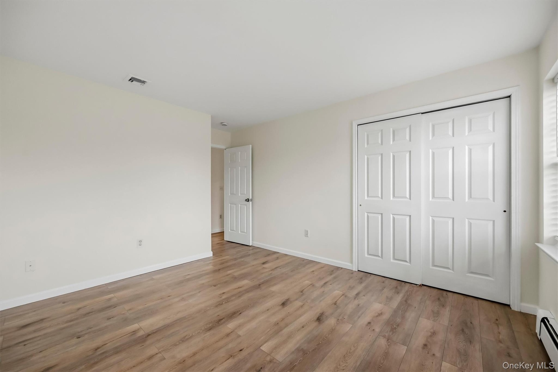 More than enough room for a full bedroom setup, with substantial closet space built in.