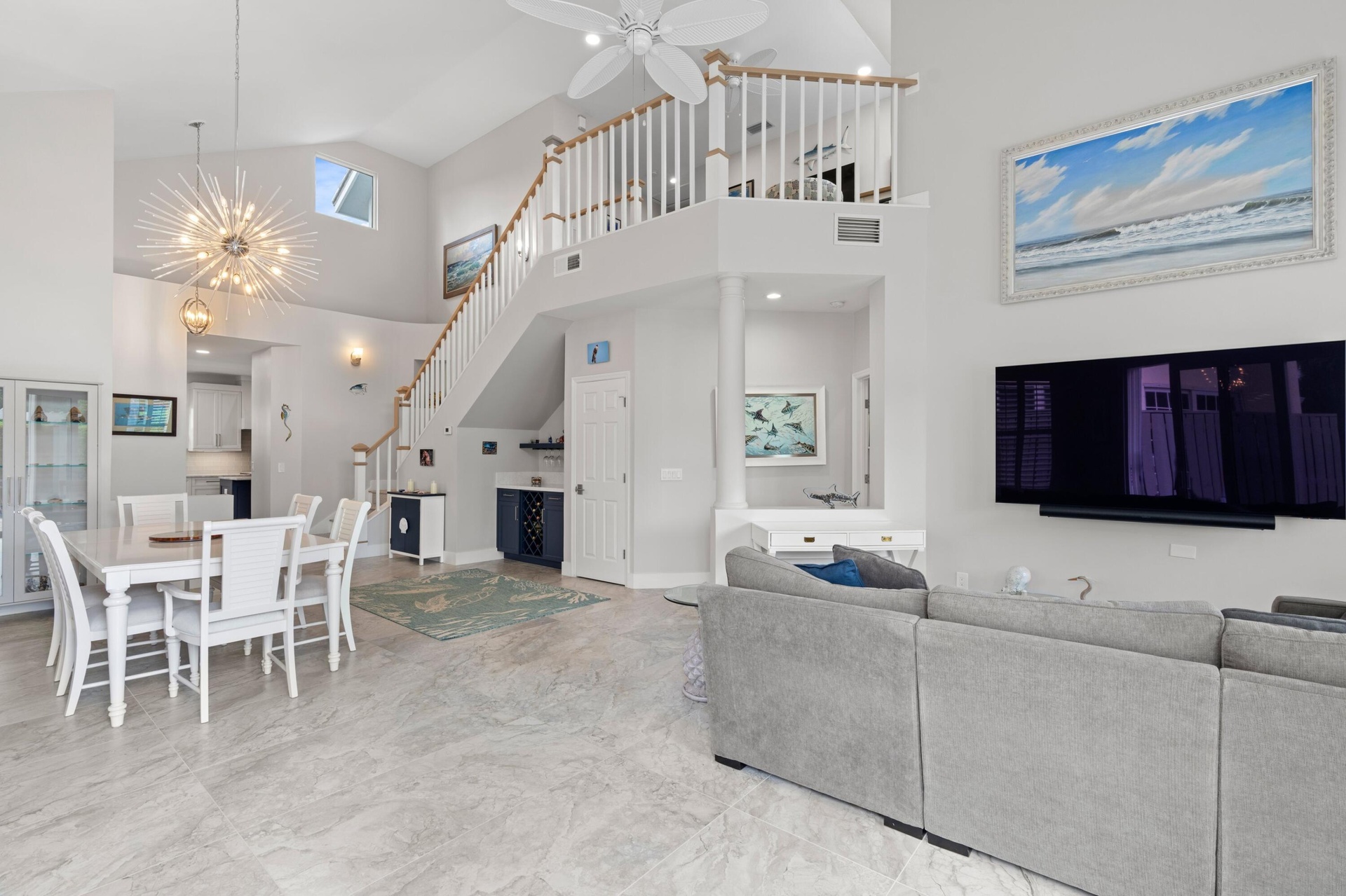 Looking from living room to to dining area and loft