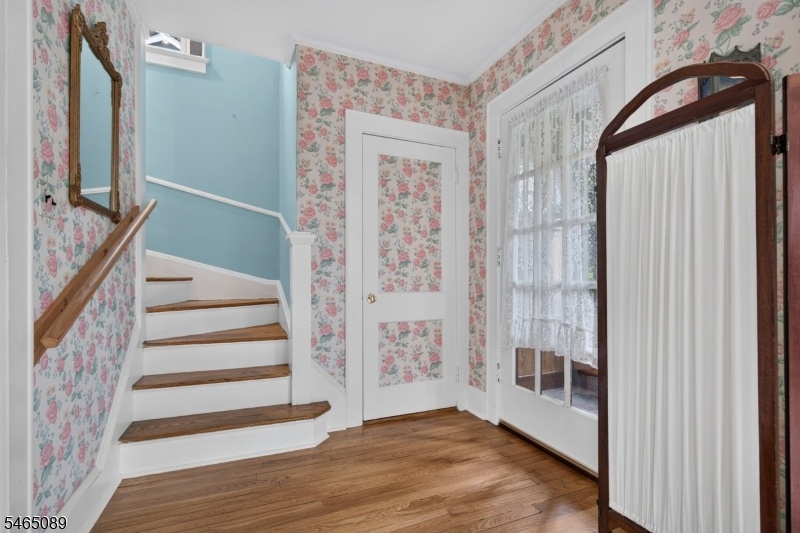 Foyer showing powder room