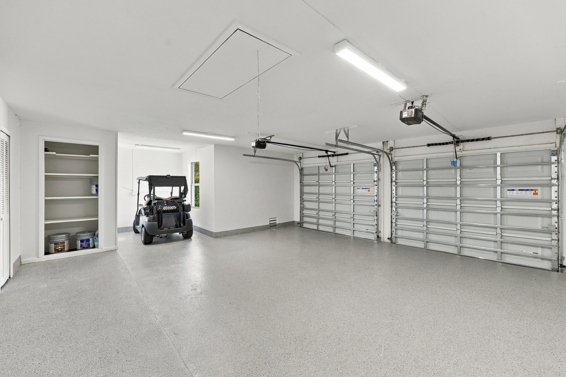 oversized garage can house golf cart.
