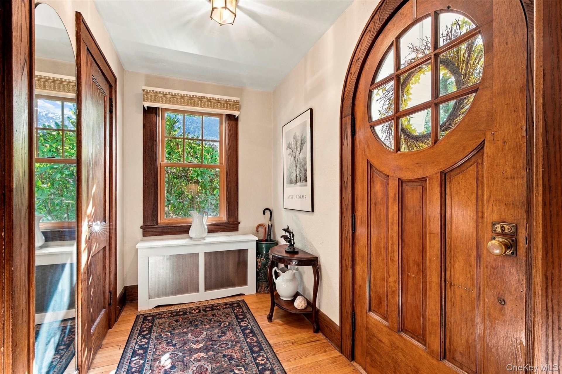 Evocative Tudor-Revival entry and foyer.