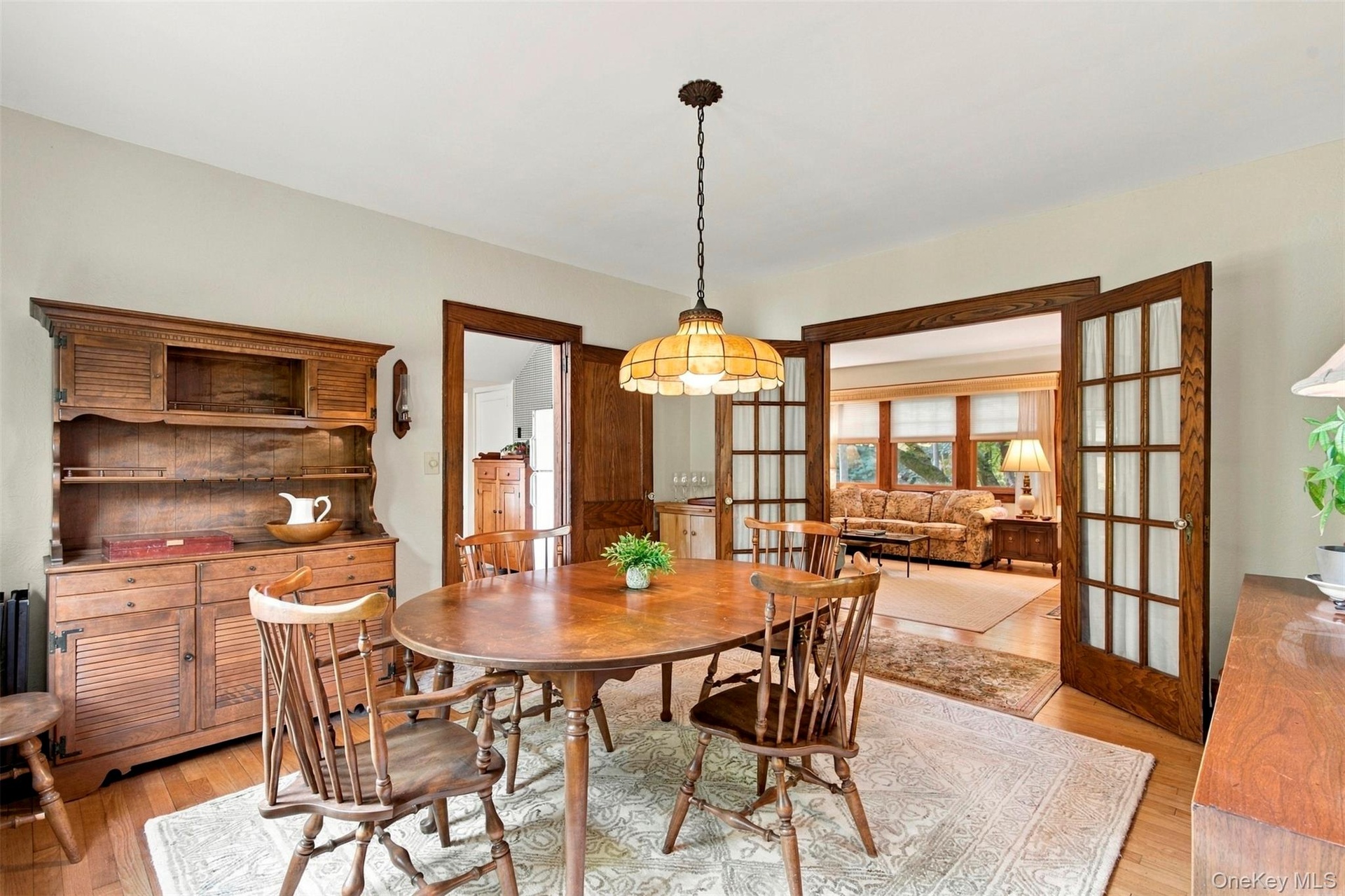 French Doors lead from the Dining Room to the Living Room.