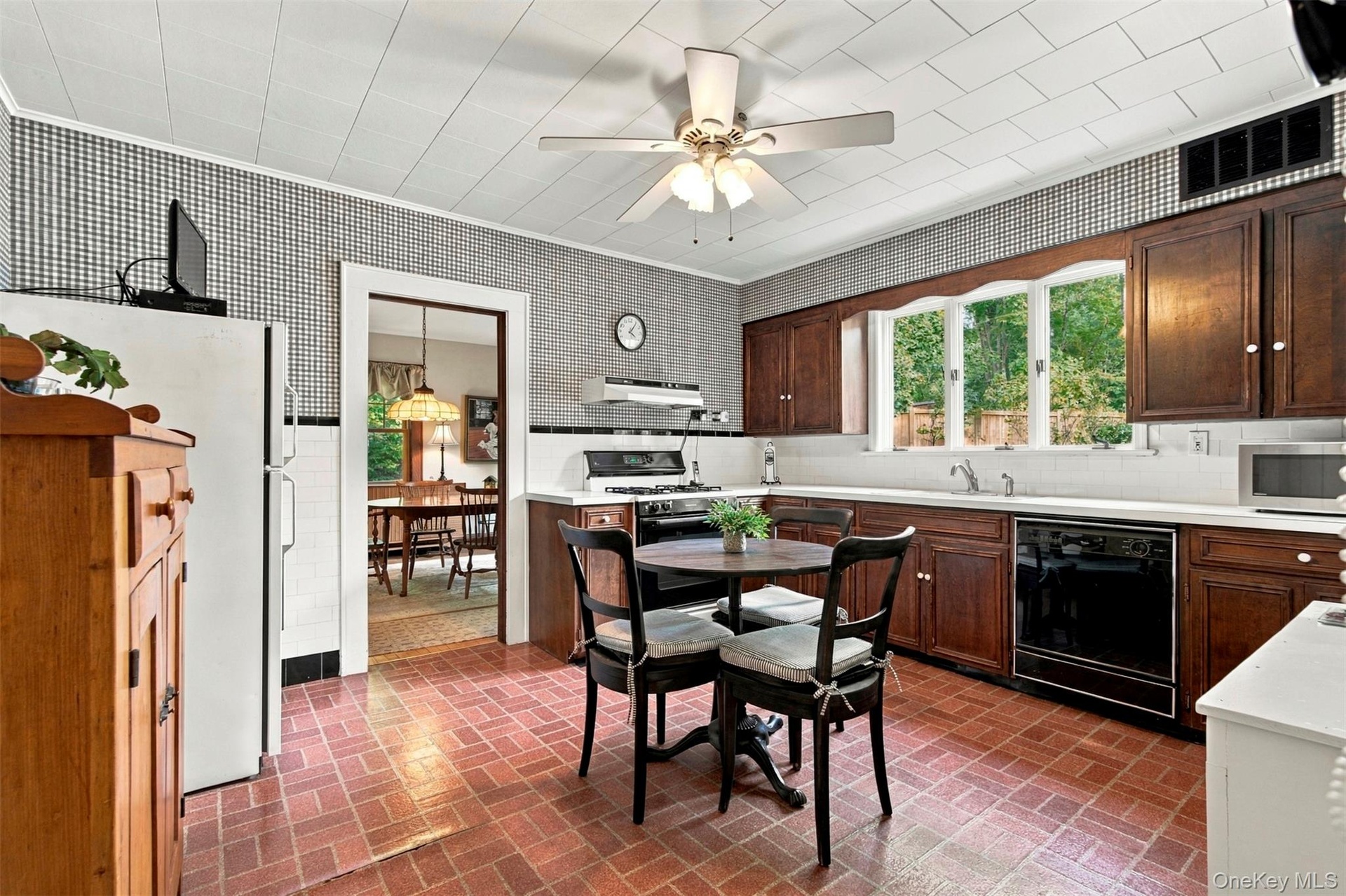 Spacious eat-in kitchen with generous  storage.