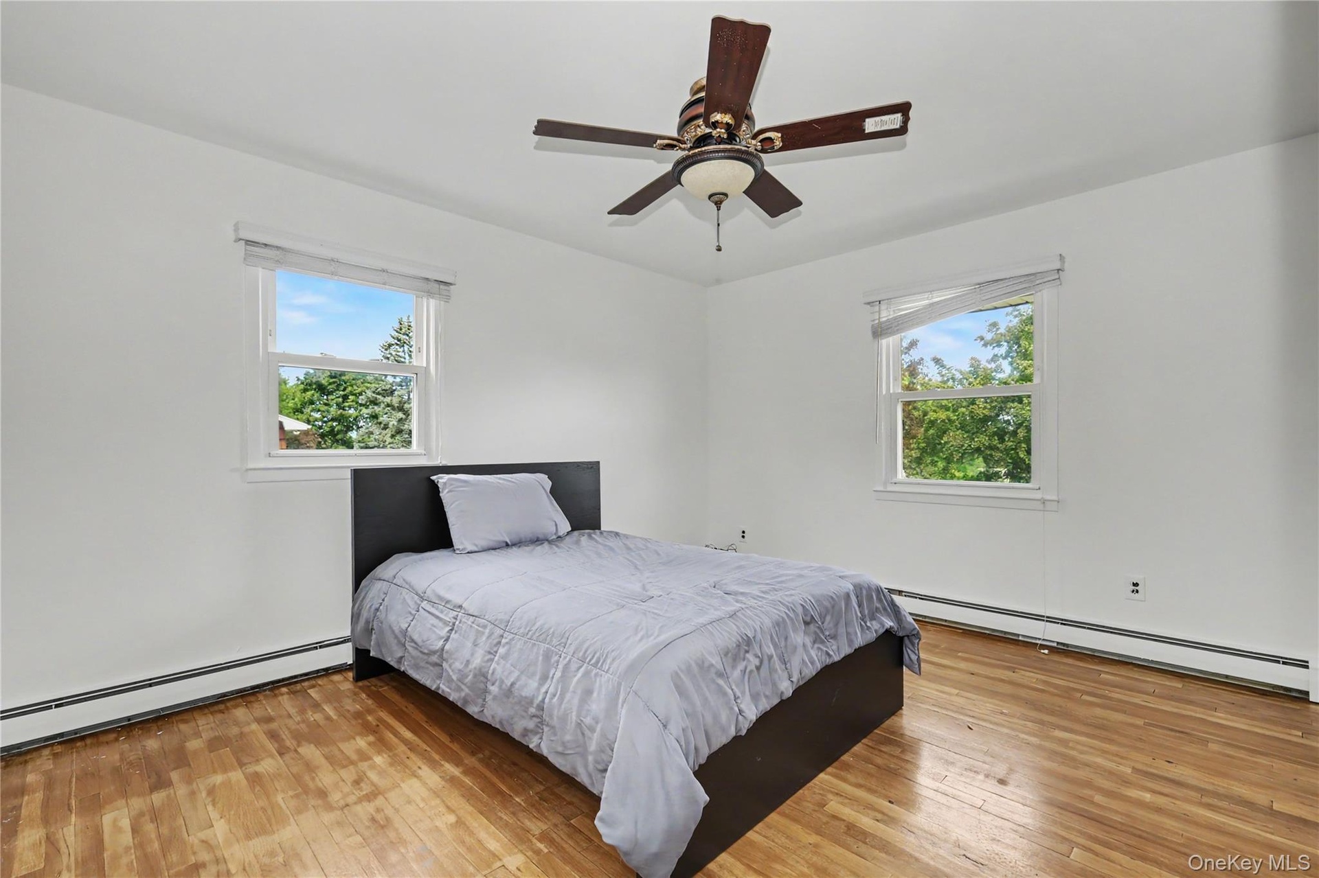 Third amply sized bedroom with great natural light and ceiling fan