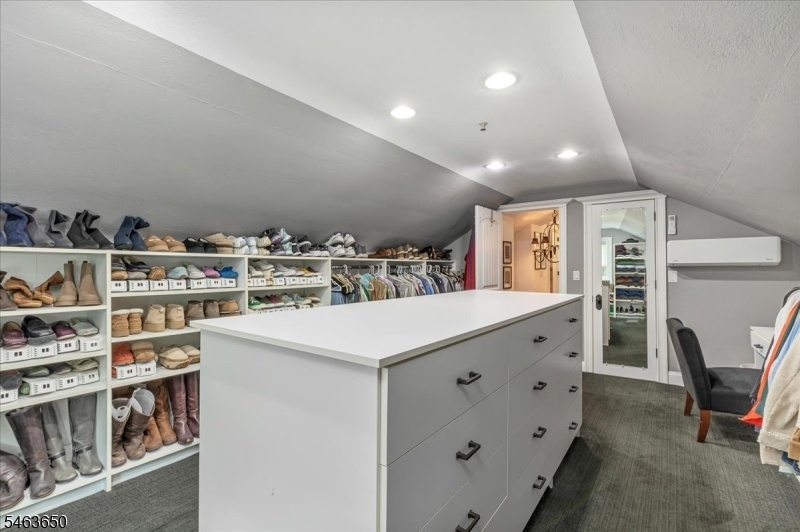 Primary Bedroom walk-in closet
