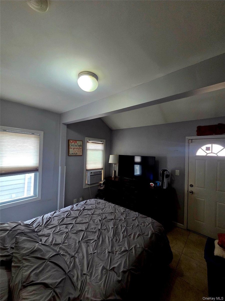 1st floor main bedroom with backyard access
