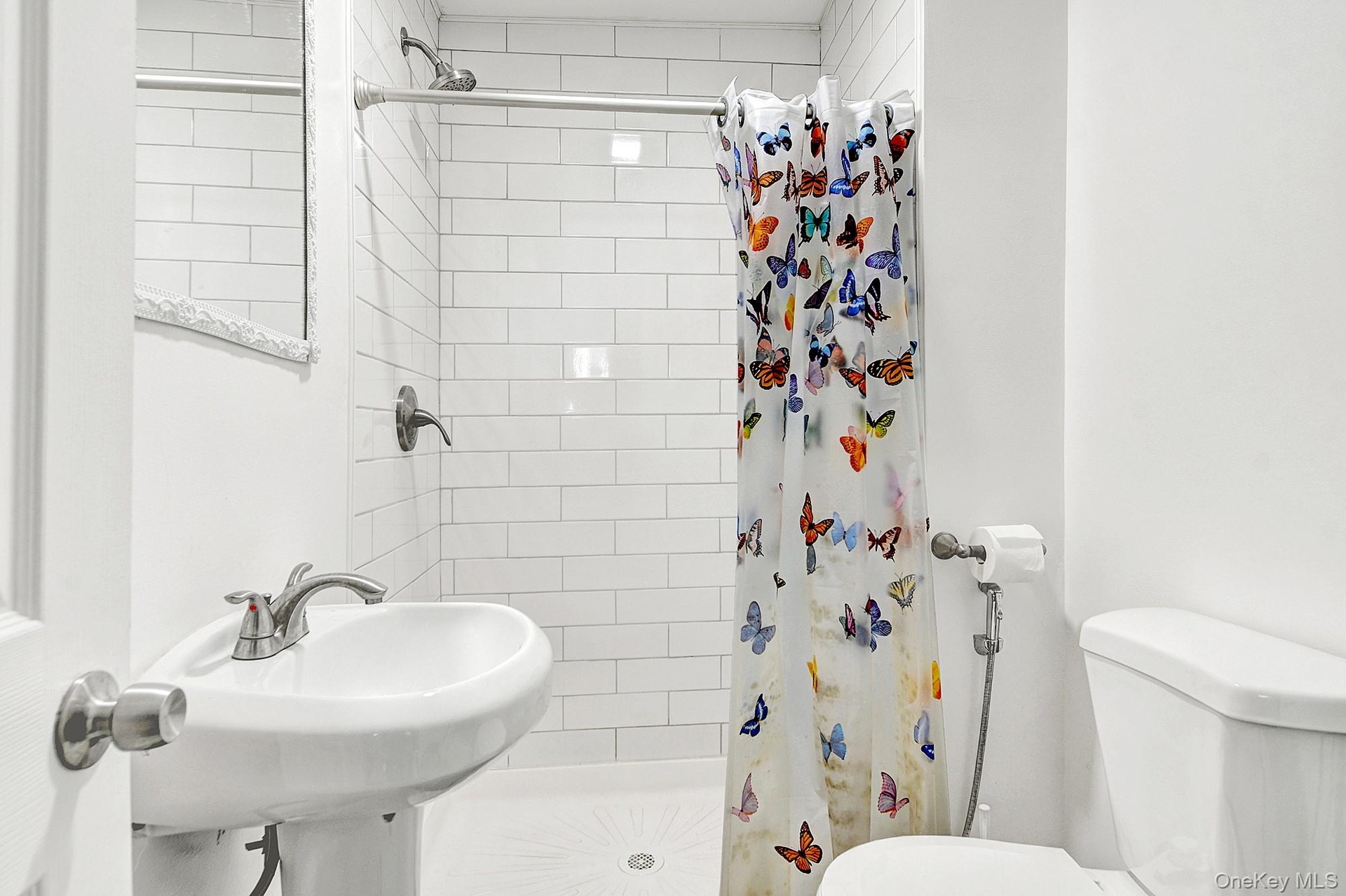 Primary bathroom with a walk-in shower