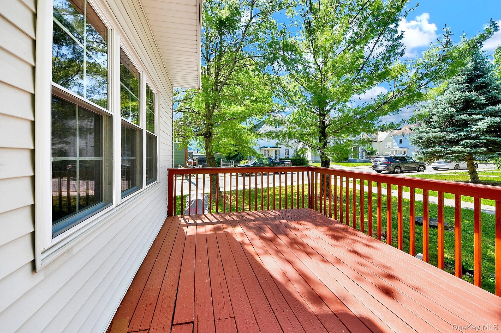 Large wooden deck off the kitchen where you can grill and dine al fresco