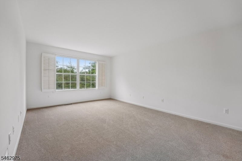 Primary Bedroom with lg Window