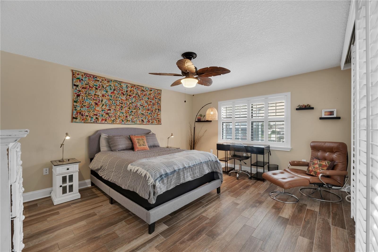 The split-bedroom floor plan offers privacy and flexibility with this secondary bedroom located on the opposite side on the home from the Primary Suit