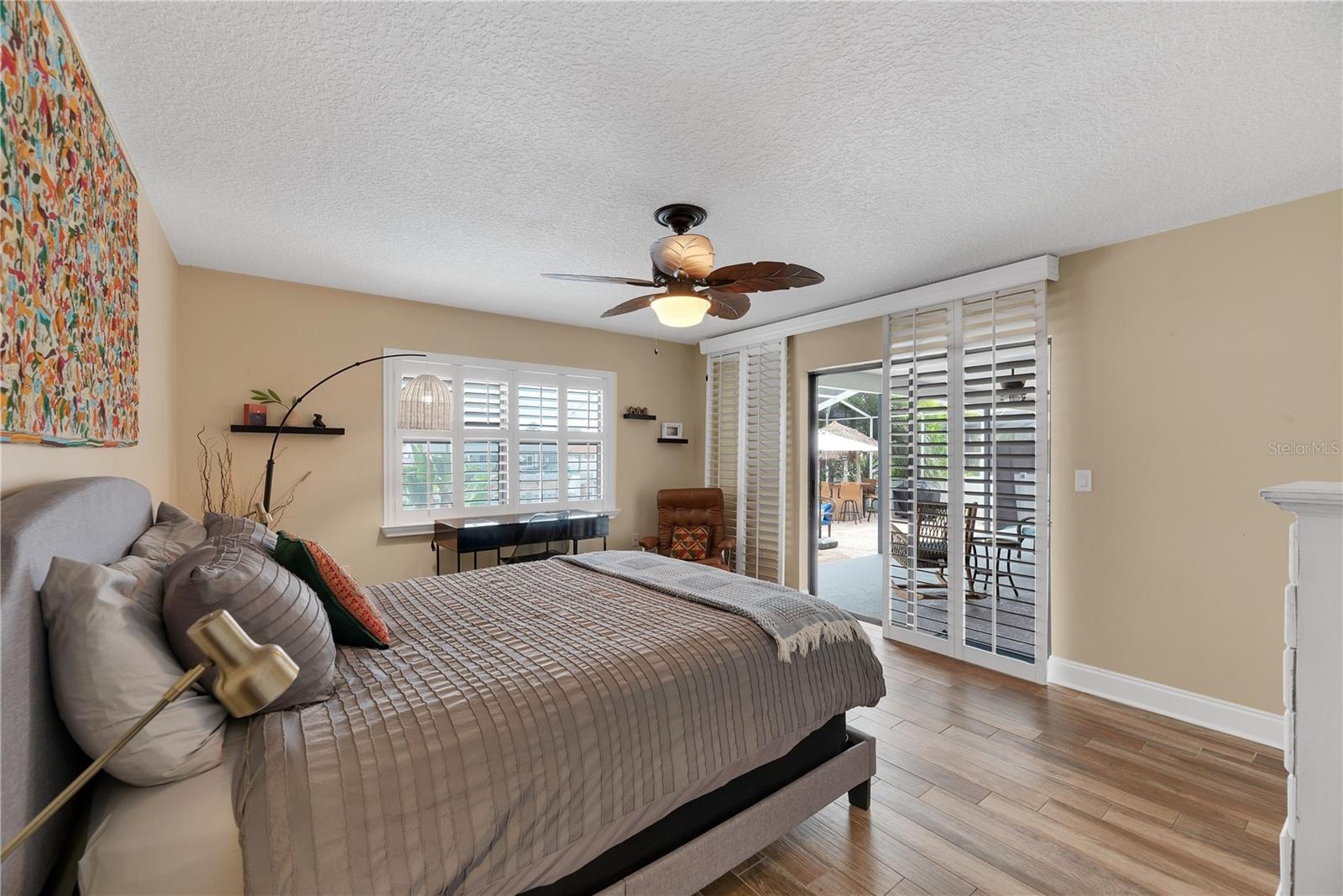 This secondary bedroom is located on the back of the home with private access to the lania.
