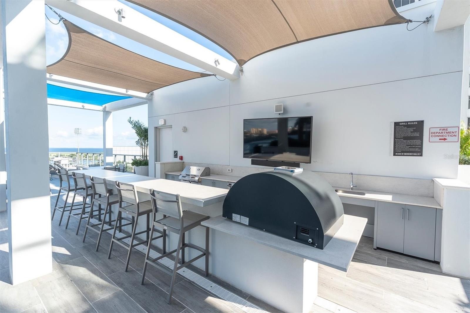 Amenity deck outdoor kitchen for entertaining.
