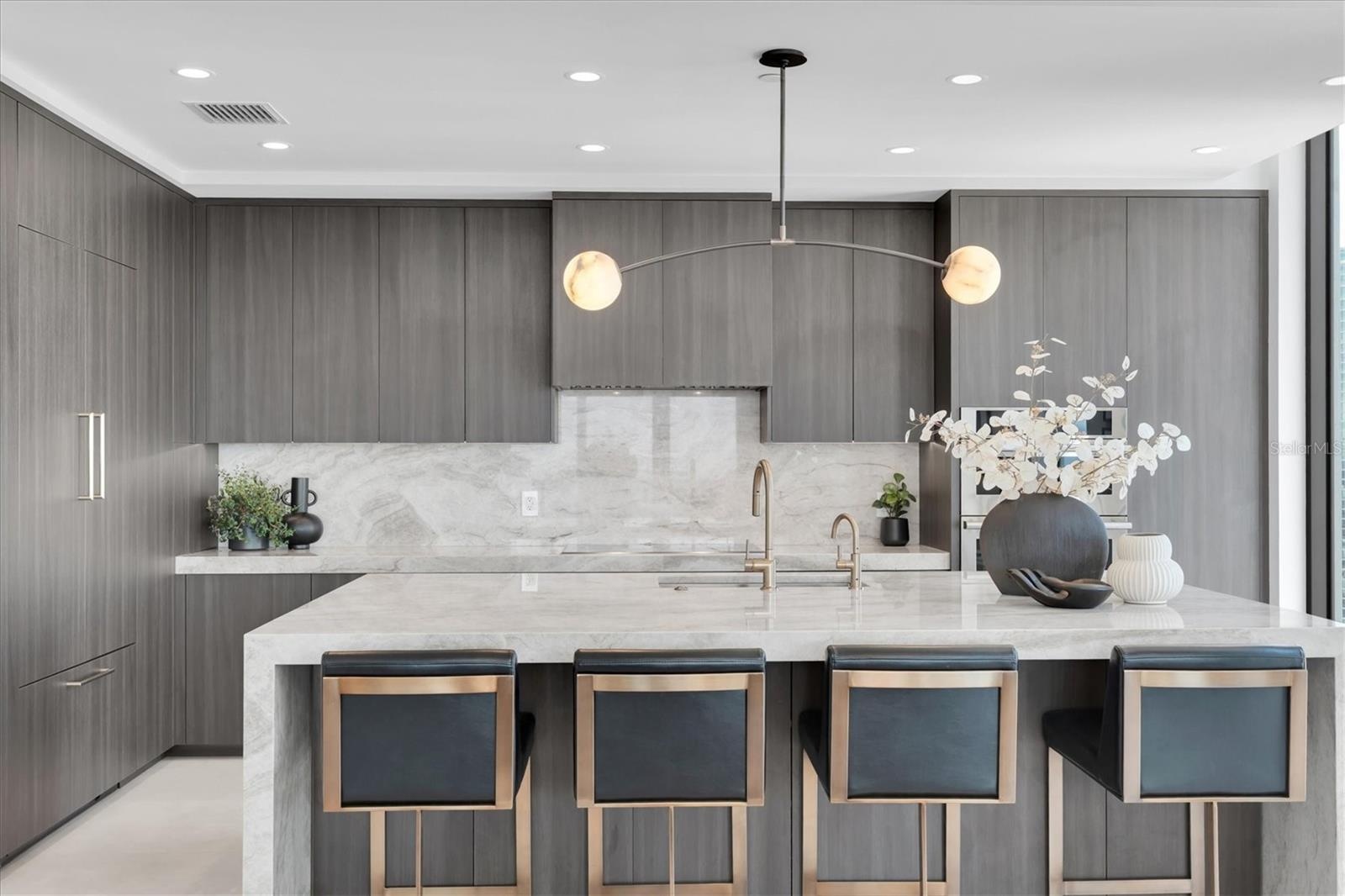 Open kitchen layout ideal for hosting guests.