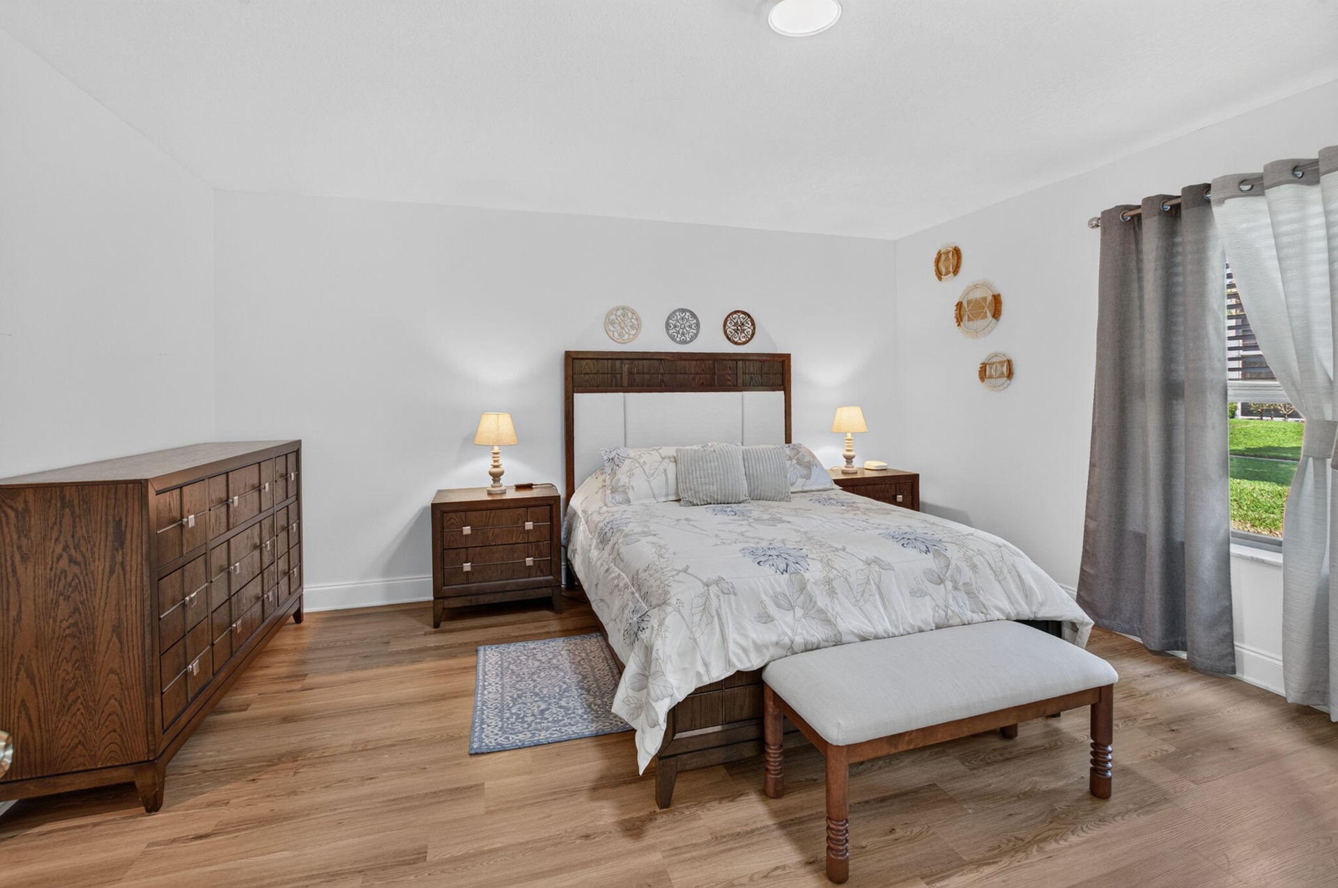 Queen sized bed, wall closet and walk-in closet