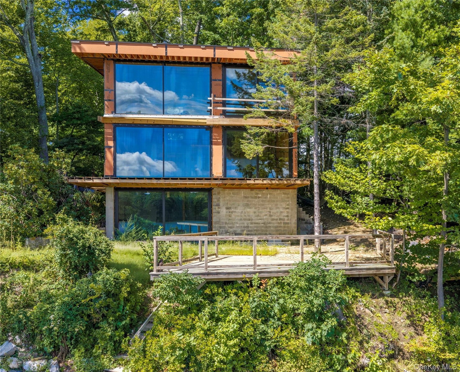 The current owner, together with a well-known local builder, has completed the heavy lifting. Major structural work is in place, permits have been sec