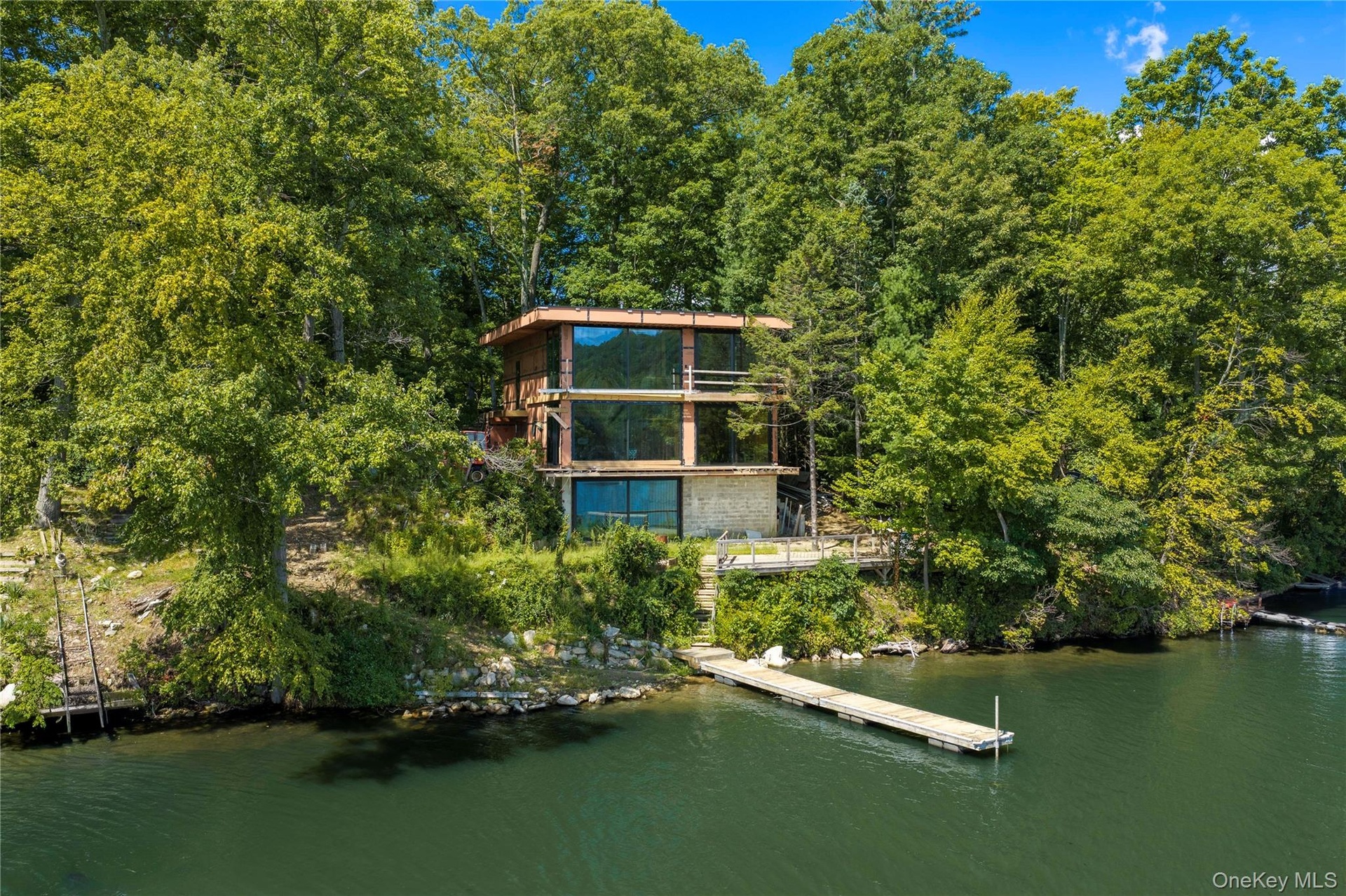 This is a once-in-a-lifetime opportunity to complete a modern architectural masterpiece on one of the most extraordinary settings imaginable—a private