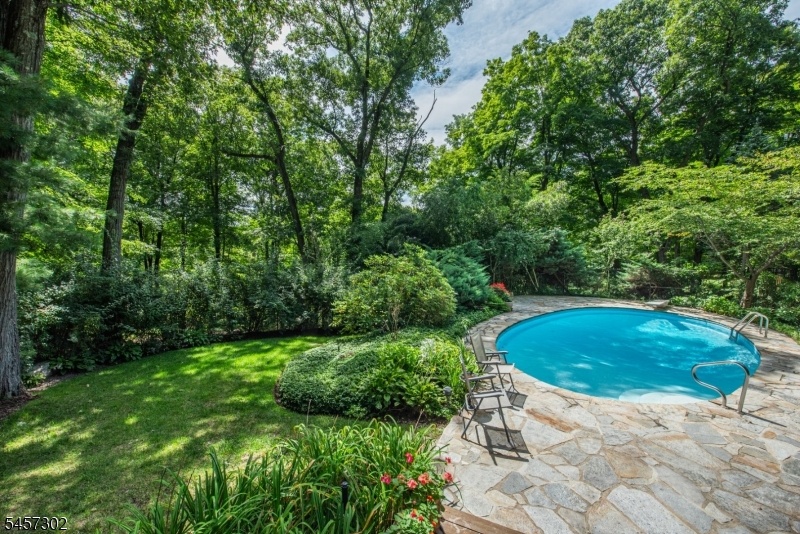 Flagstone patio - oval pool