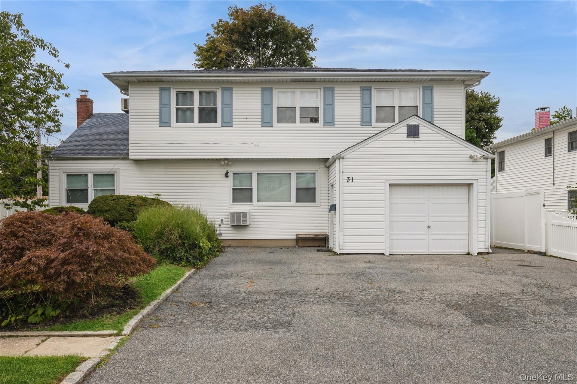 Permitted mother-daughter colonial w/ full finished basement w/ walk-out access