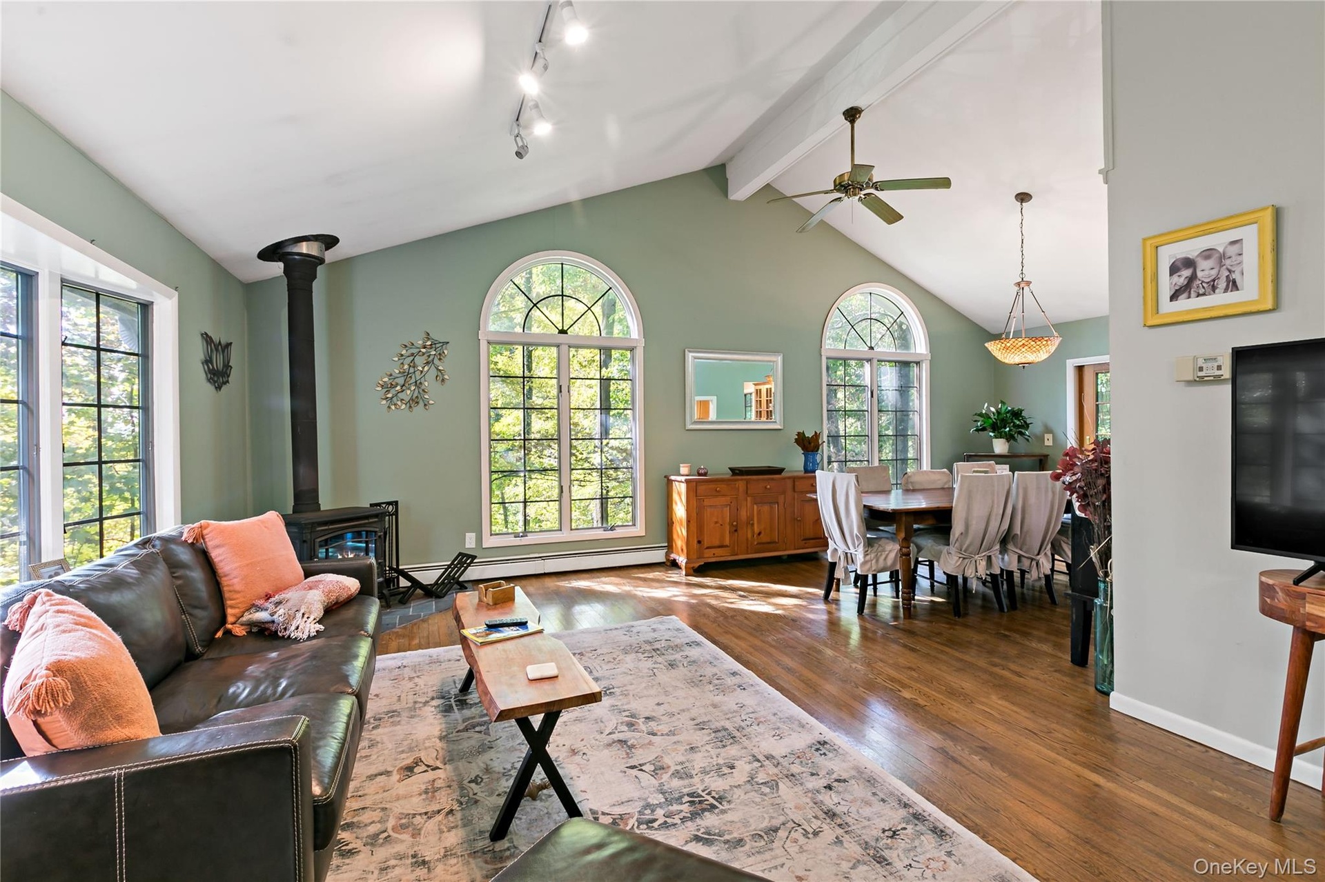 Elegant windows overlooking the woods. Tree house anybody?