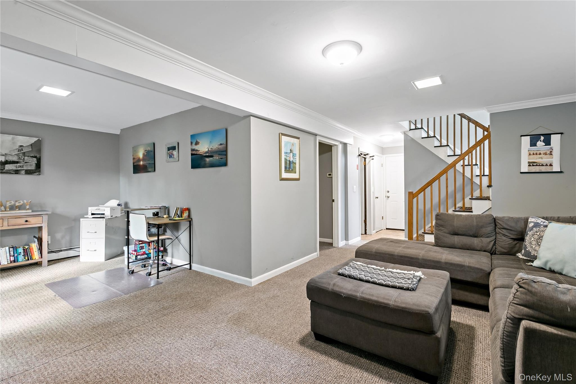Photo showing doors to the laundry room, two car garage, and potential fourth bedroom.