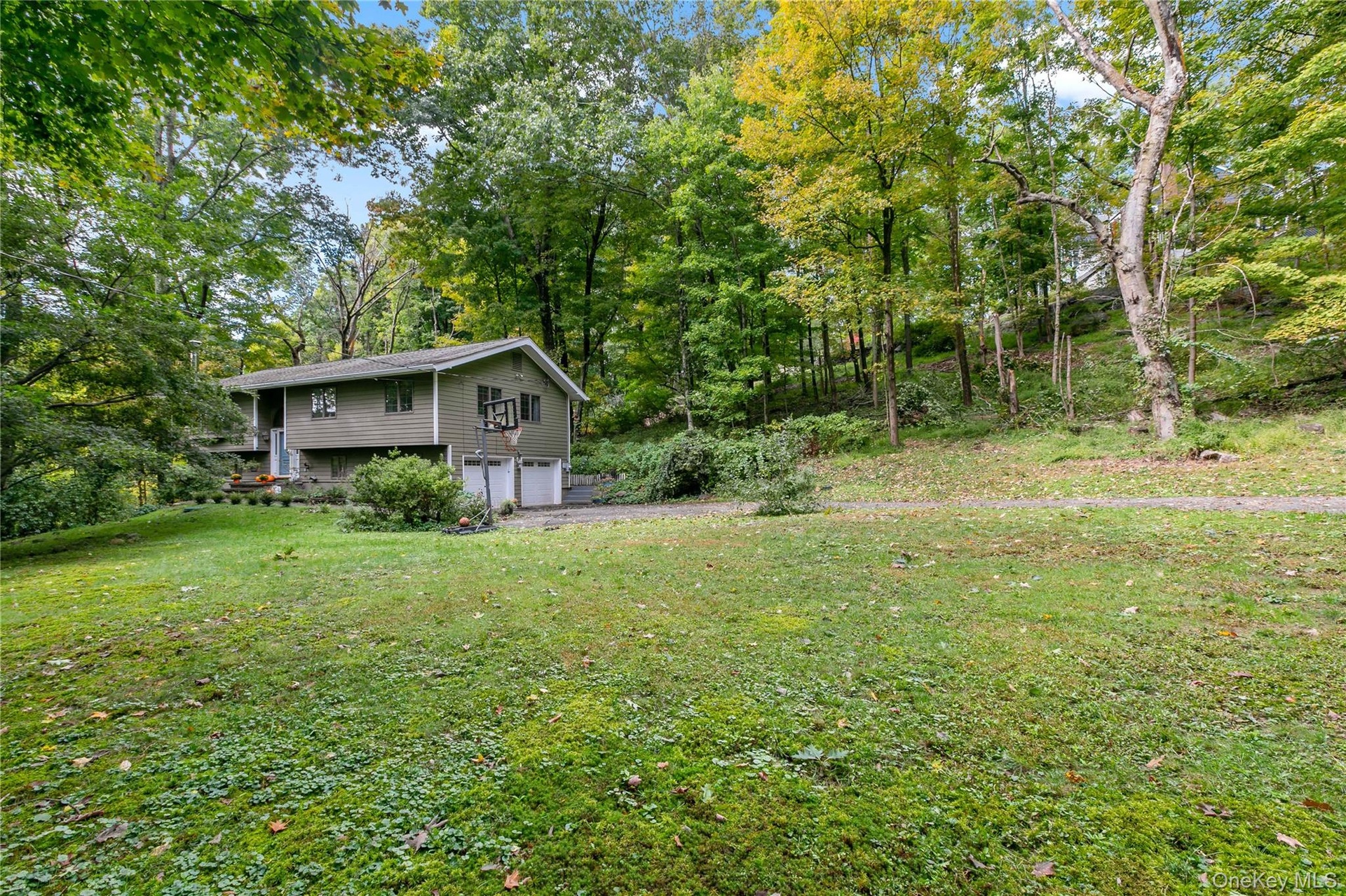 Long gracious driveway leads to the home.