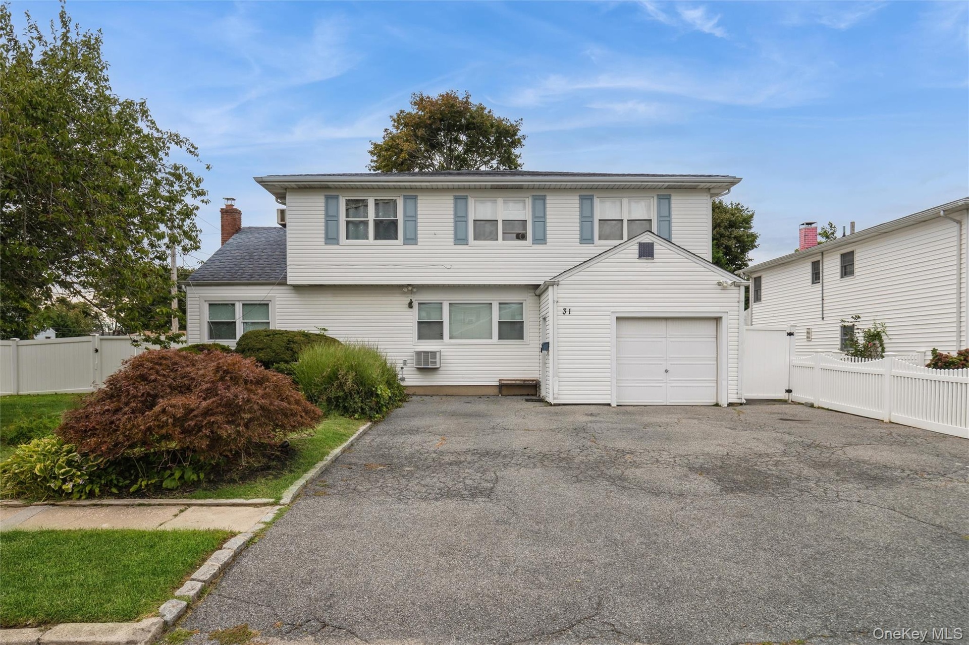Permitted mother-daughter colonial w/ full finished basement w/ walk-out access