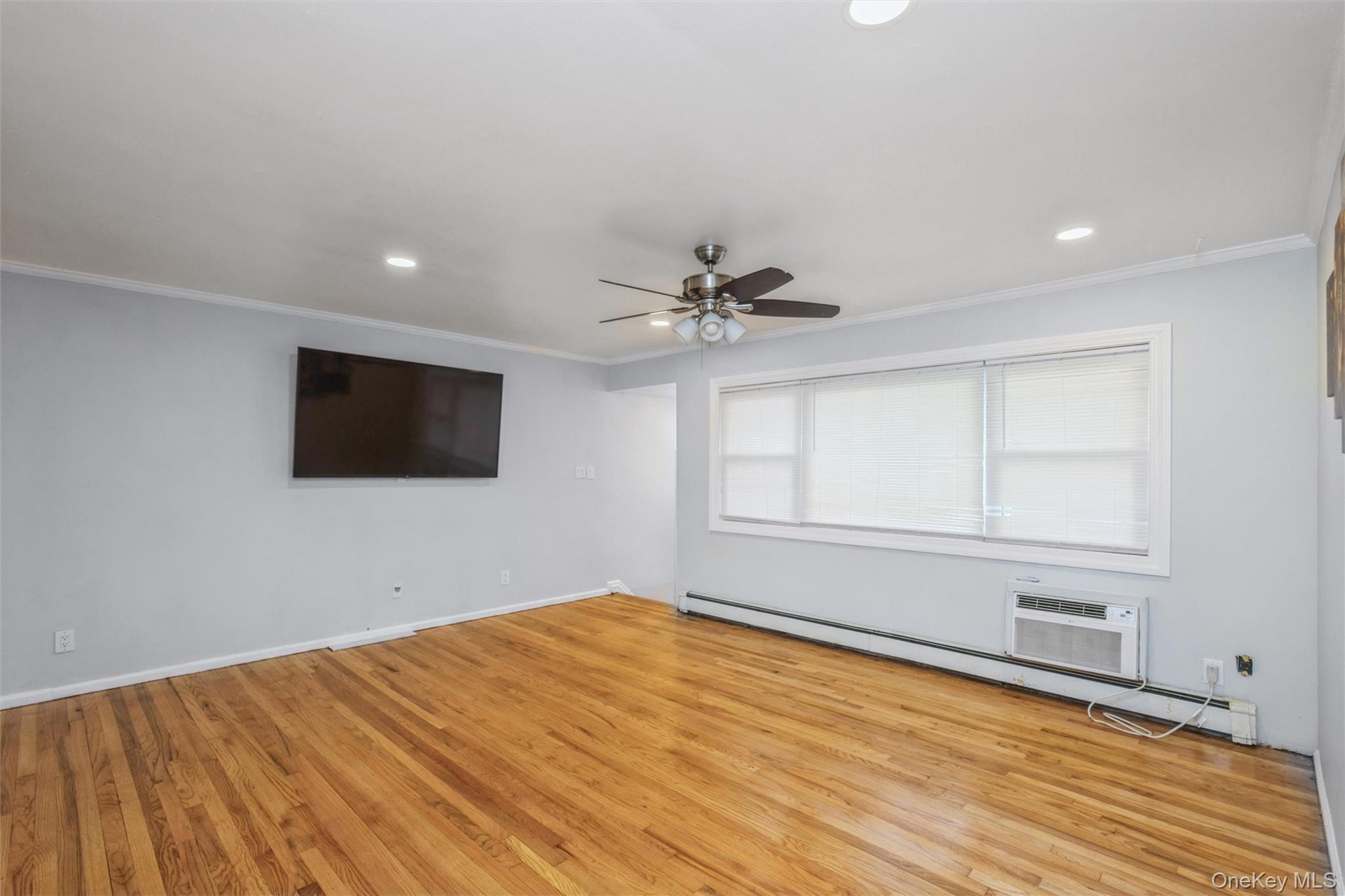 First floor living room with hardwood floors.