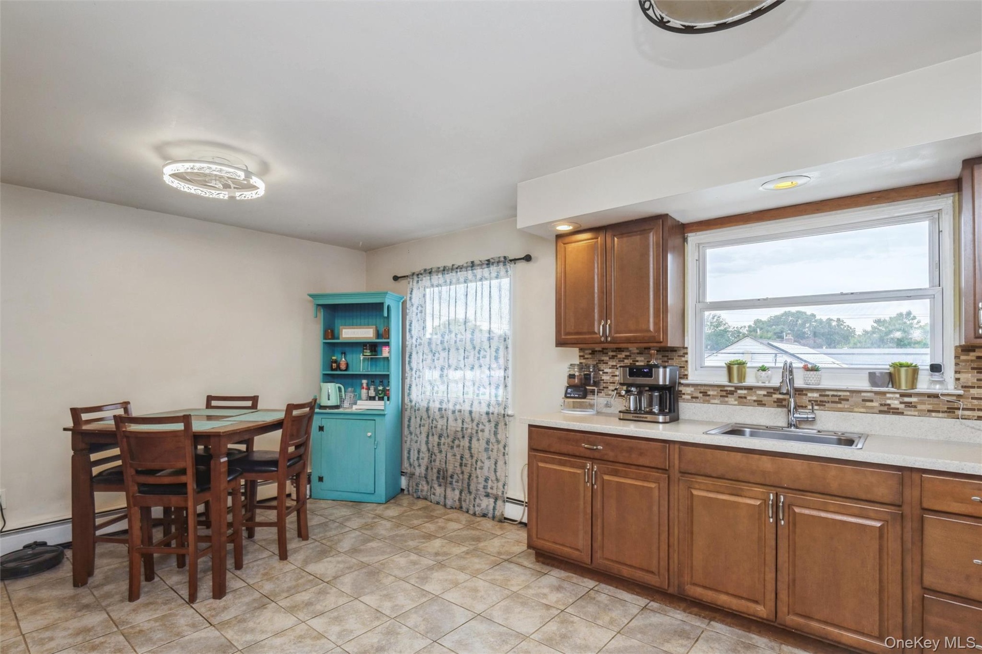 Second floor large kitchen with new stainless steel appliances and huge pantry room.