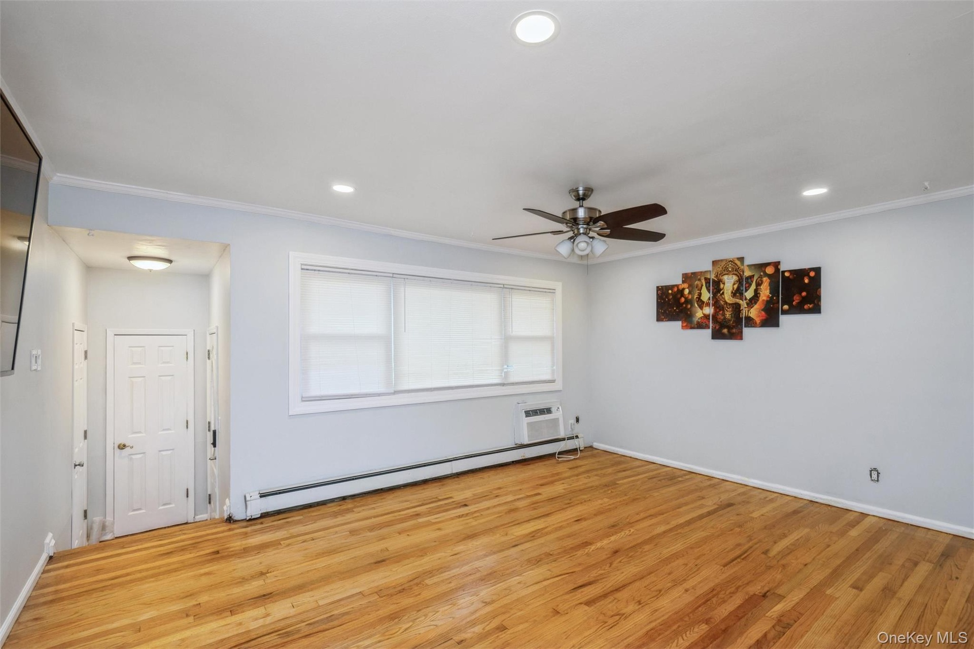 First floor living room with hardwood floors.