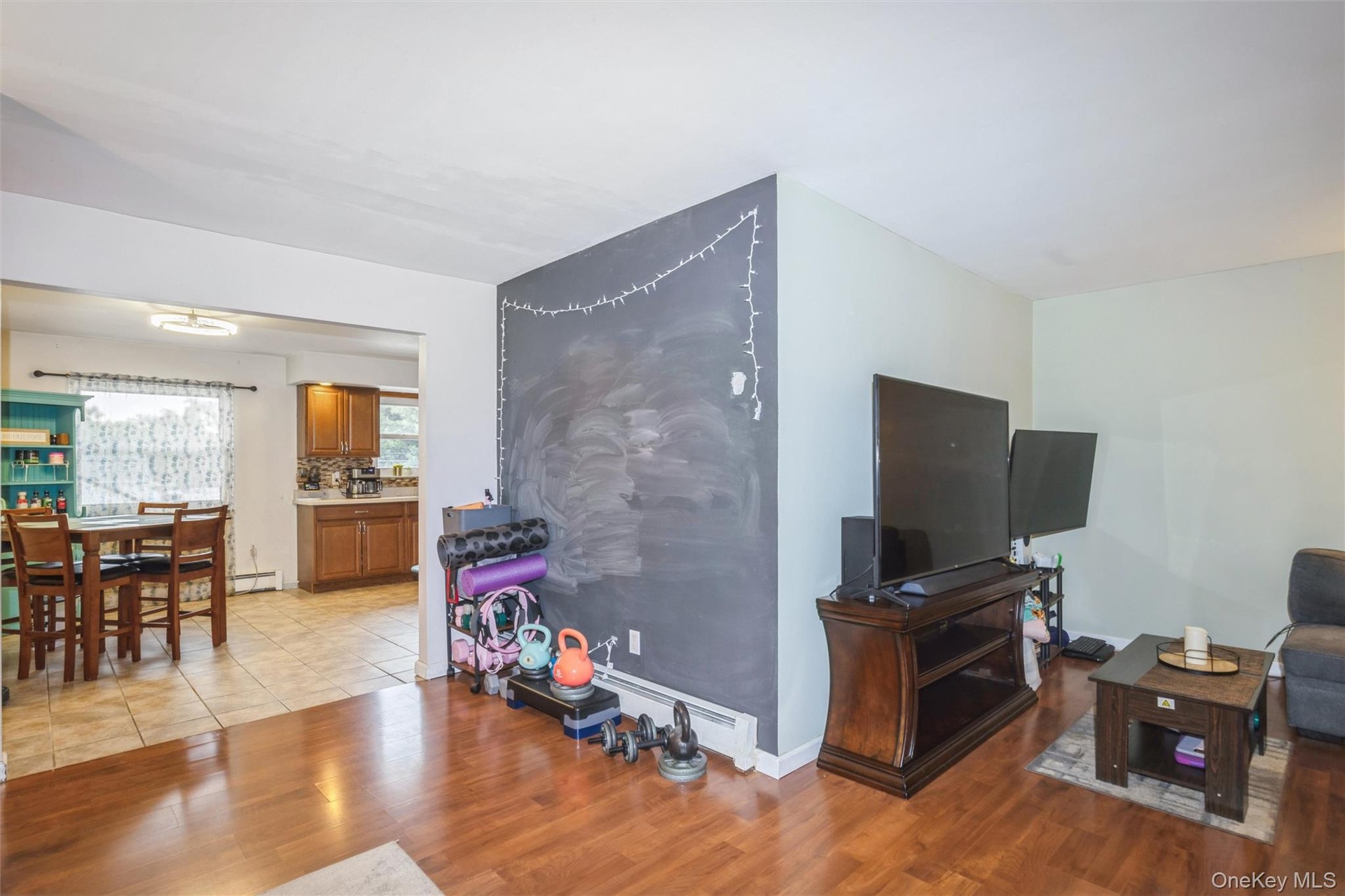 Open layout on second floor with living room and kitchen