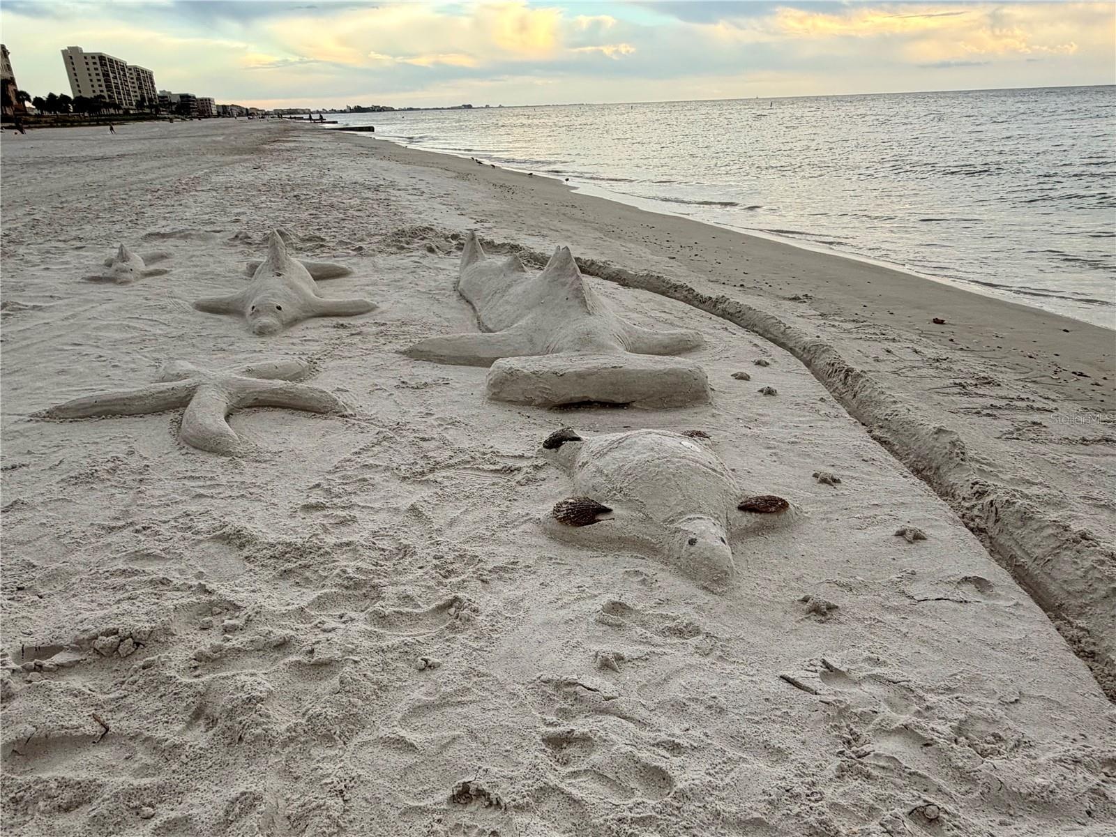 CREATIVE SAND SCULPTURES FROM REG BEACHGOERS