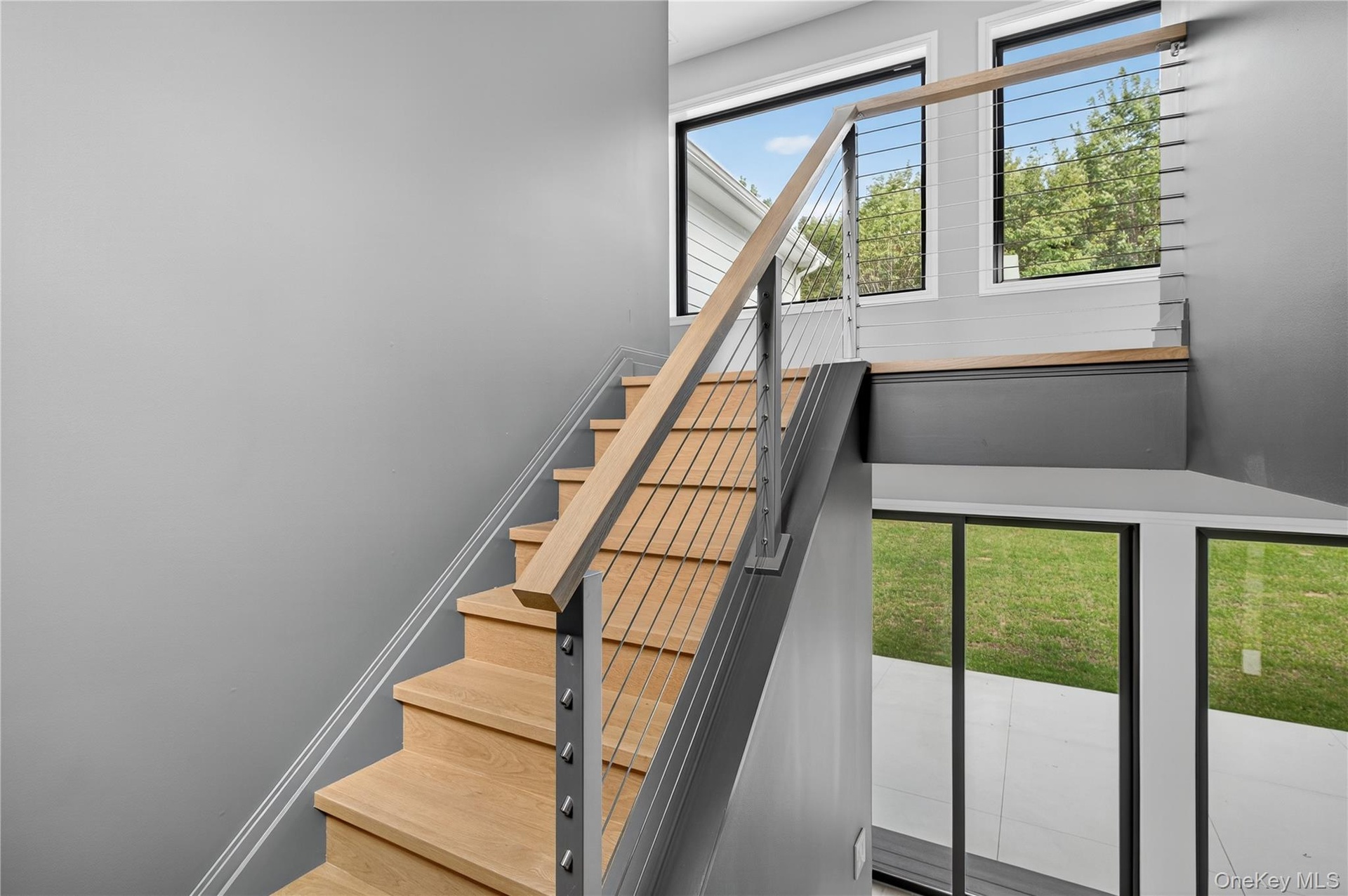 Stairs featuring baseboards