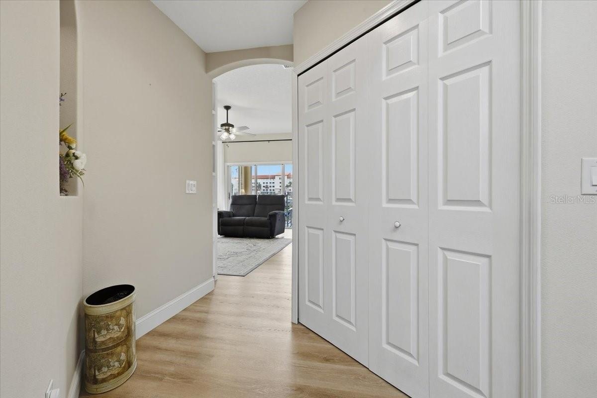 Foyer leading to family room and kitchen